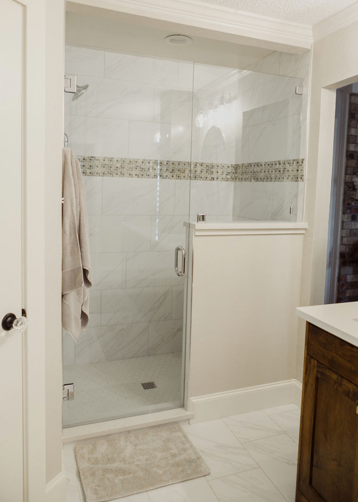 Mid-sized minimalist master white tile porcelain tile and white floor freestanding bathtub photo in Dallas with flat-panel cabinets, brown cabinets, white walls, quartzite countertops, a hinged shower door and white countertops