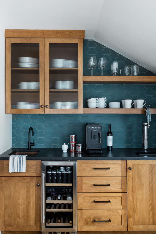 Example of a transitional home bar design in Boston