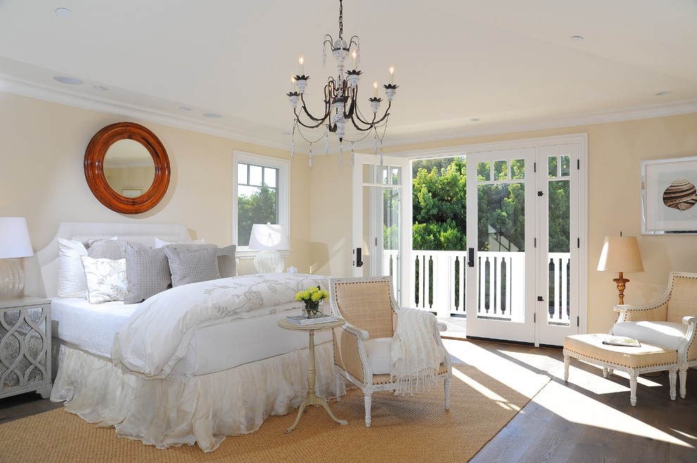 Inspiration for a beach style bedroom in Los Angeles with yellow walls.