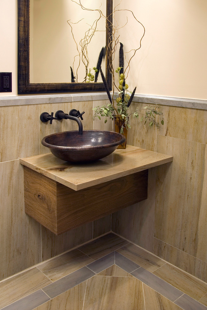 Photo of a small contemporary powder room in Miami with brown tile, porcelain tile, beige walls, porcelain floors, a vessel sink, brown floor and beige benchtops.
