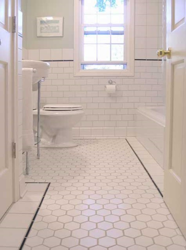 Mid-sized traditional 3/4 bathroom in New York with white tile, ceramic tile, green walls, ceramic floors and a pedestal sink.