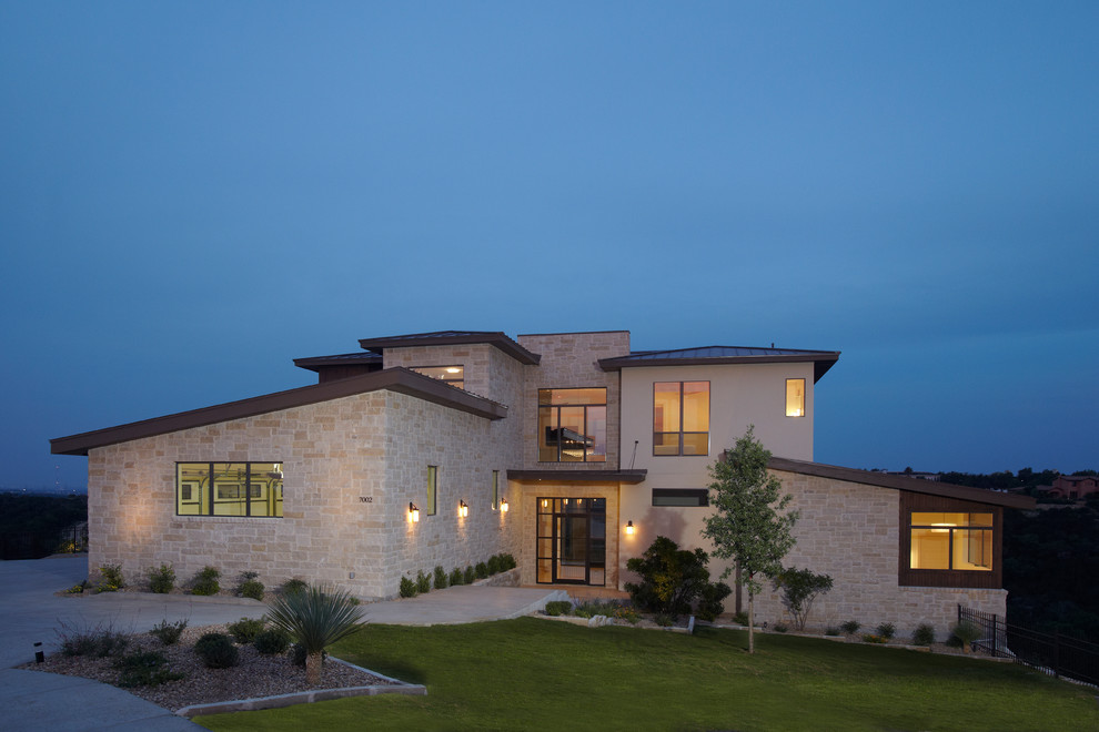 This is an example of a transitional two-storey exterior in Austin.