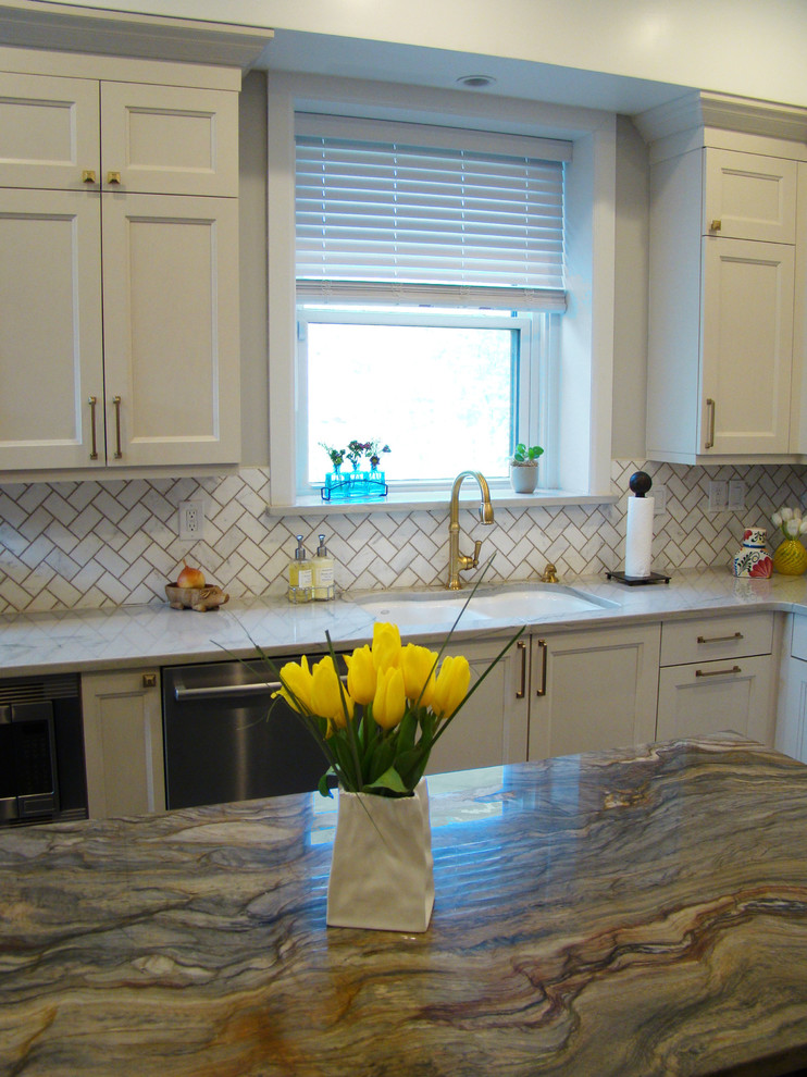 Inspiration for a large transitional u-shaped ceramic tile and gray floor eat-in kitchen remodel in Denver with a double-bowl sink, recessed-panel cabinets, white cabinets, granite countertops, white backsplash, marble backsplash, stainless steel appliances, an island and multicolored countertops