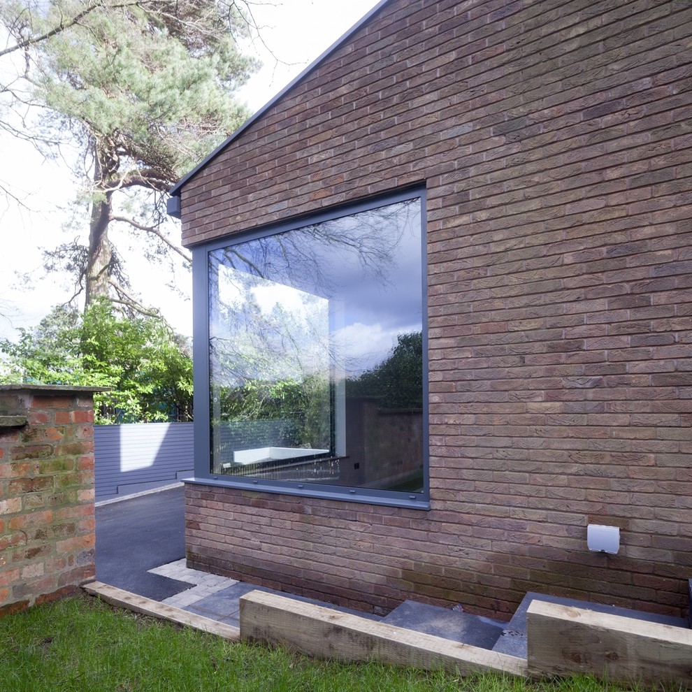 Design ideas for a contemporary one-storey exterior in Cheshire.