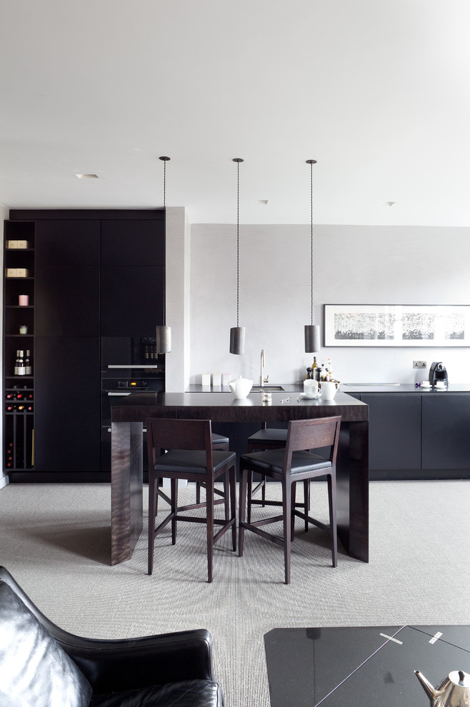 This is an example of a small contemporary kitchen in London.