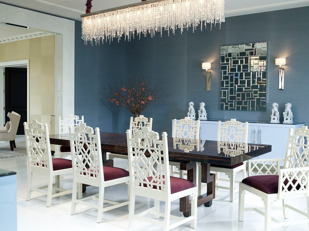 This is an example of a contemporary dining room in Miami with blue walls.