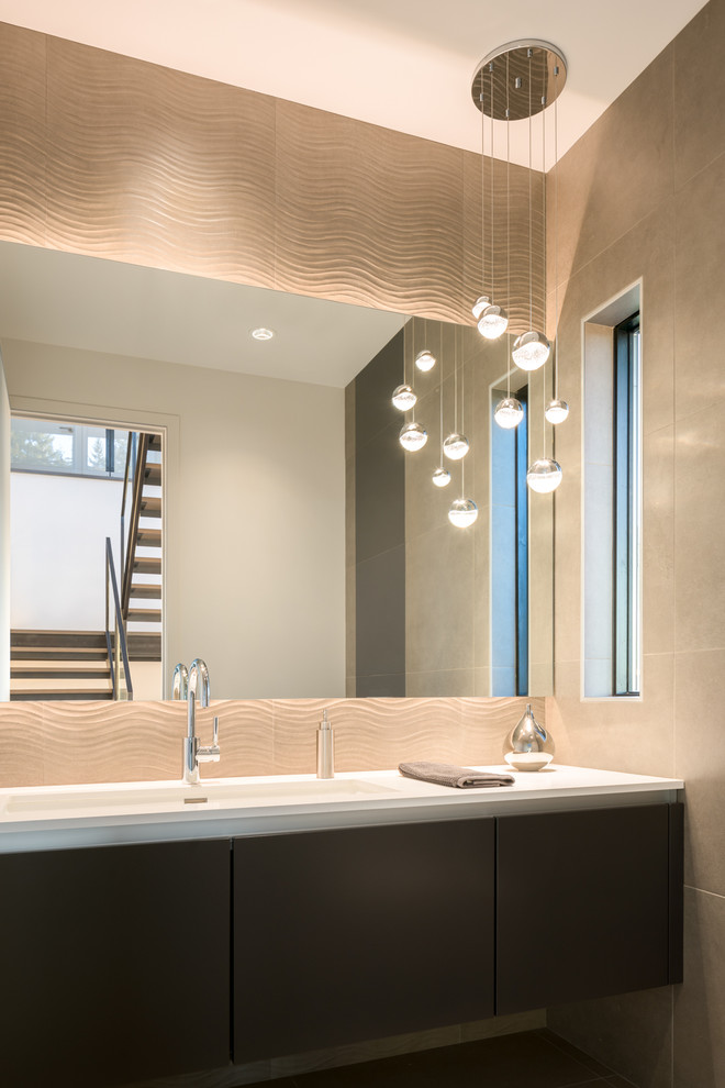 Photo of a mid-sized contemporary powder room in Seattle with flat-panel cabinets, dark wood cabinets, engineered quartz benchtops, beige walls, dark hardwood floors, a trough sink and white benchtops.