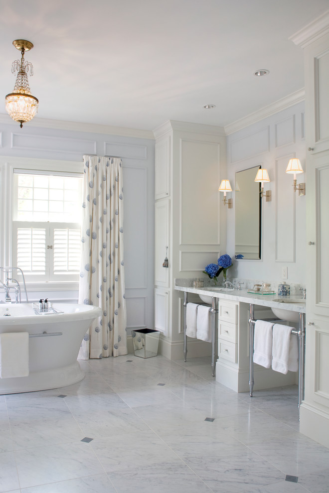 Inspiration for a traditional bathroom in Boston with marble benchtops.