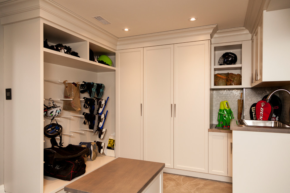 Mudroom - large transitional mudroom idea in Toronto