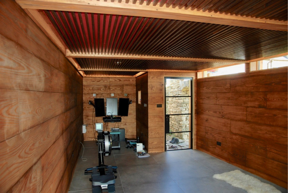Inspiration for a small scandinavian multipurpose gym in Wiltshire with brown walls, plywood floors, grey floor and coffered.