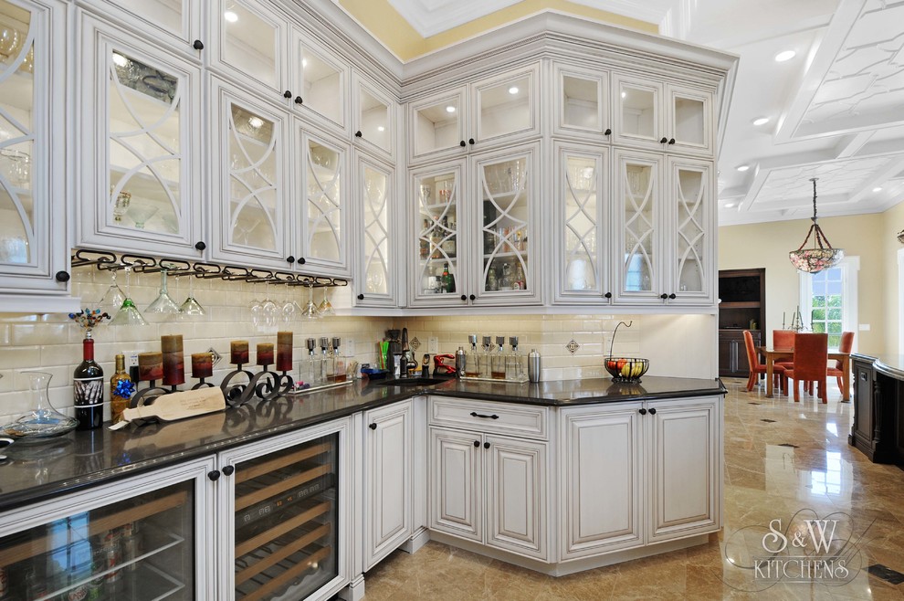 Inspiration for an expansive traditional kitchen pantry in Tampa with an undermount sink, open cabinets, white cabinets, quartz benchtops, black splashback, glass sheet splashback, stainless steel appliances, marble floors and with island.