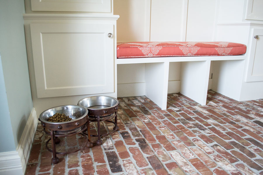 Design ideas for a mid-sized traditional mudroom in Louisville with grey walls, brick floors, a single front door, a white front door and red floor.