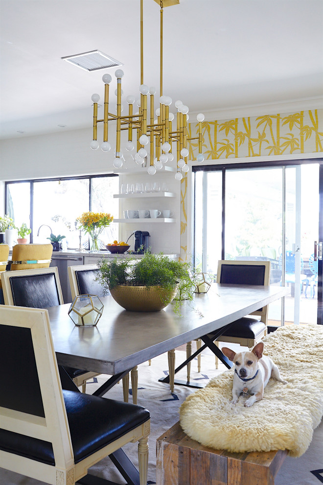 This is an example of a mid-sized contemporary open plan dining in Los Angeles with white walls.