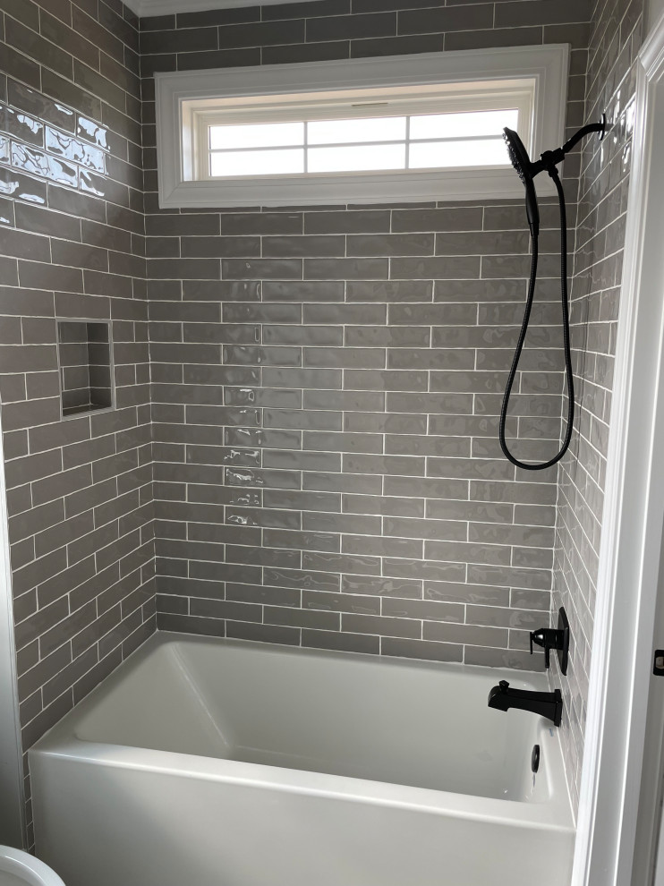 Inspiration for a gray tile and porcelain tile ceramic tile alcove bathtub remodel