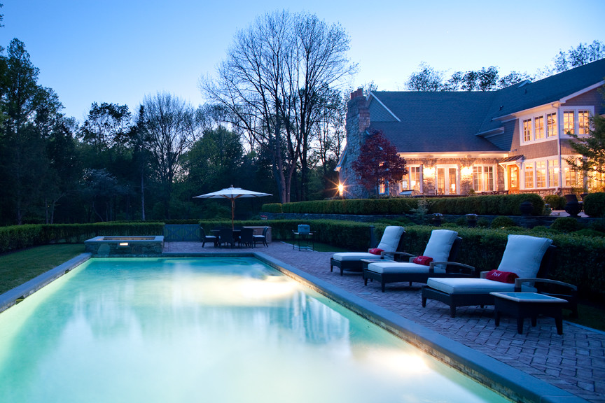Inspiration for a rustic pool remodel in New York