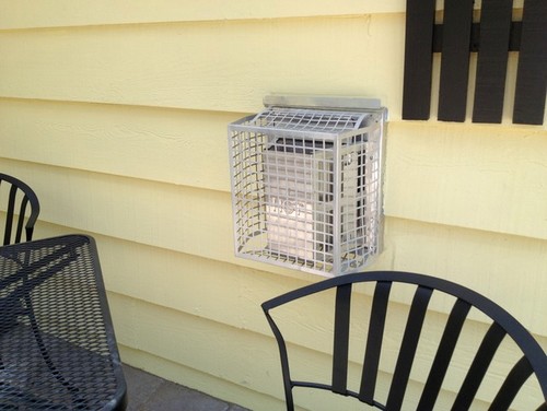 My gas fireplace has a direct vent on the wall outside of my living room. We have just turned that outside area into a patio and suddenly the aluminium protective cage that surrounds my fireplace vent is an eyesore. I thought if I painted the cage to matc
