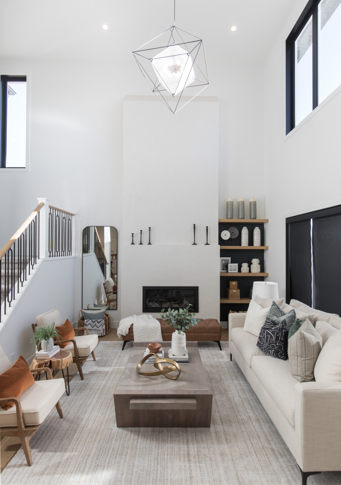 Inspiration for an expansive transitional open concept living room in Calgary with white walls, light hardwood floors, a ribbon fireplace, a plaster fireplace surround, multi-coloured floor, vaulted and wood walls.