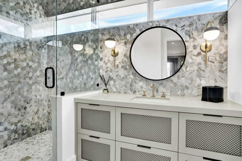 Photo of a mid-sized contemporary bathroom in Miami with grey cabinets, an alcove shower, marble, white walls, marble floors, an undermount sink, marble benchtops, a hinged shower door, a built-in vanity, shaker cabinets, gray tile, grey floor, grey benchtops and a single vanity.