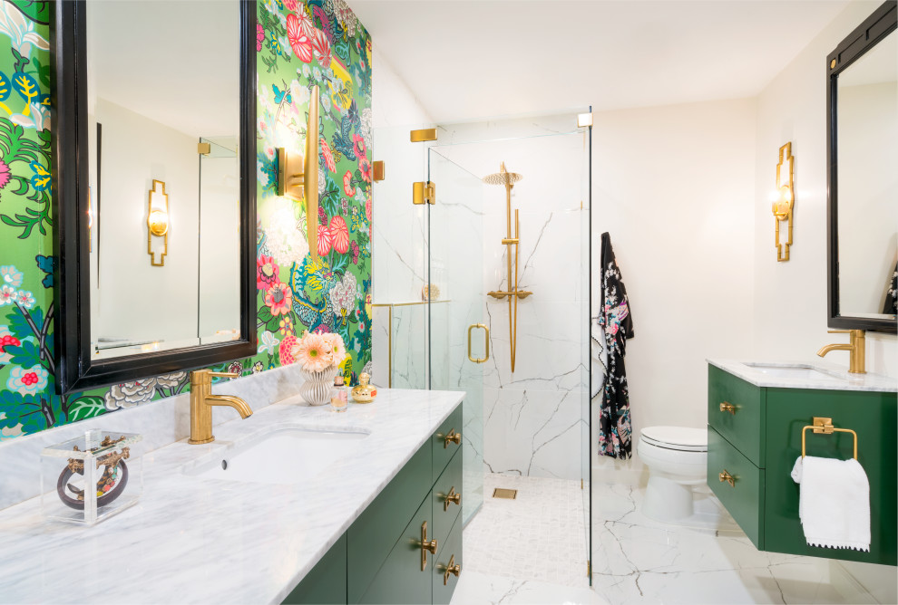This is an example of a mid-sized transitional master bathroom in Charlotte with flat-panel cabinets, green cabinets, a freestanding tub, a curbless shower, a one-piece toilet, white tile, porcelain tile, white walls, porcelain floors, an undermount sink, marble benchtops, white floor, a hinged shower door, white benchtops, a single vanity and a floating vanity.