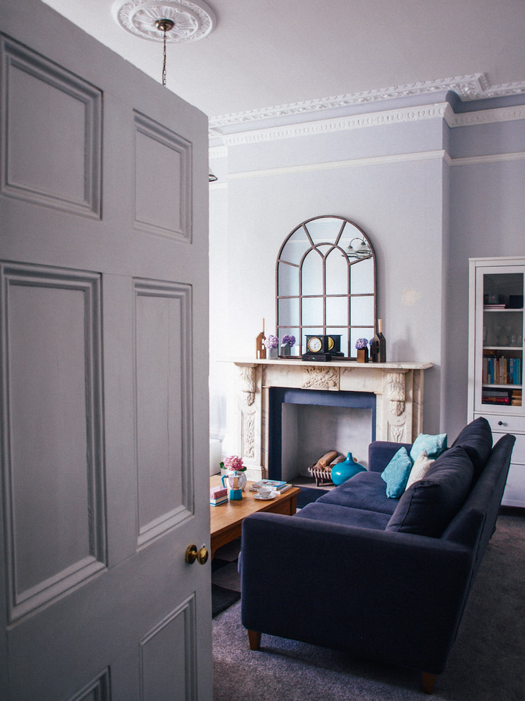 Photo of a transitional living room in Sussex.