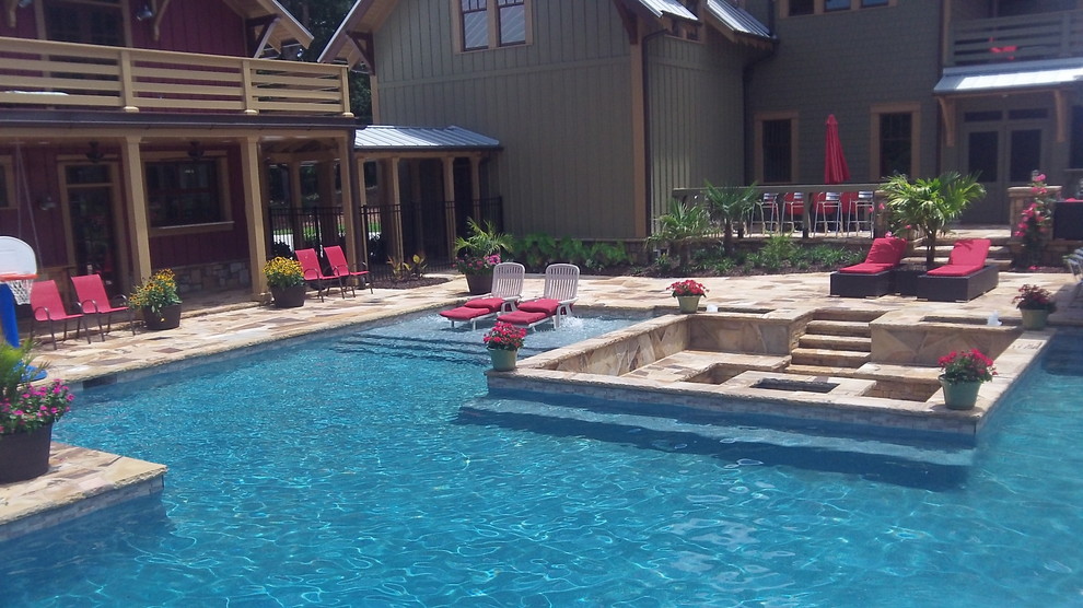 This is an example of a beach style backyard pool in Atlanta.
