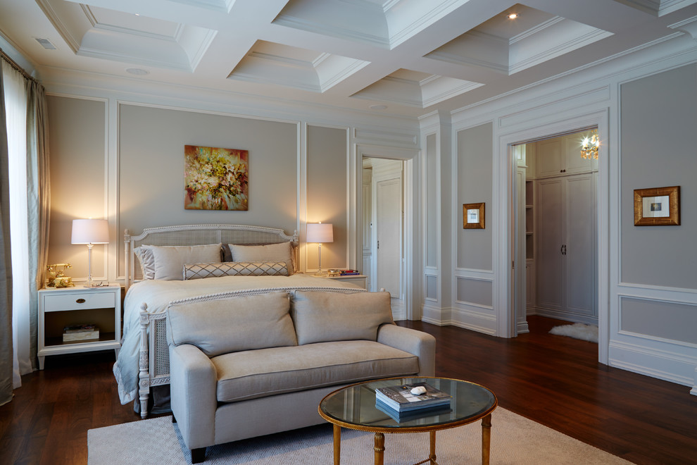 Photo of a large traditional bedroom in Toronto with grey walls and dark hardwood floors.
