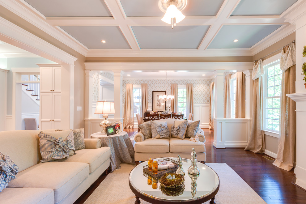 This is an example of a large traditional open concept family room in Other with grey walls, dark hardwood floors, a standard fireplace, a stone fireplace surround and a built-in media wall.