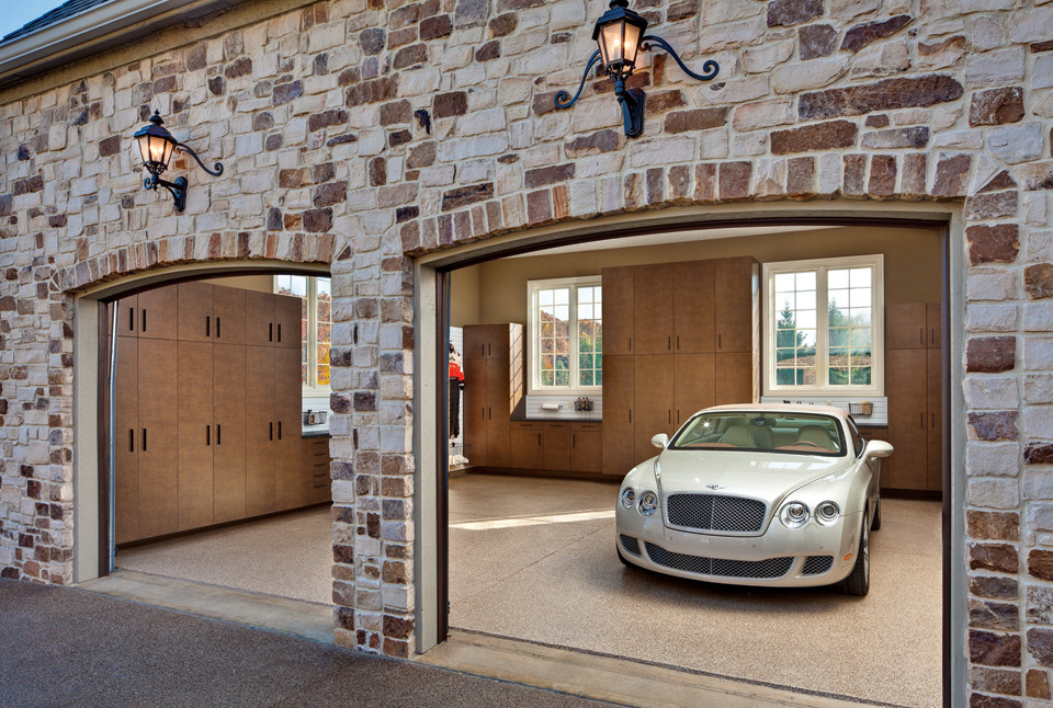 Mid-sized contemporary attached two-car garage in Cleveland.