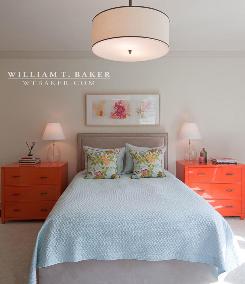 This is an example of a mid-sized transitional guest bedroom in Atlanta with white walls and carpet.