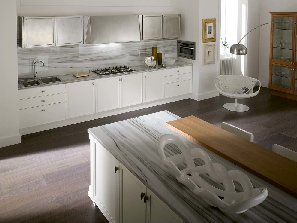 Open concept kitchen - transitional single-wall open concept kitchen idea with flat-panel cabinets and an island