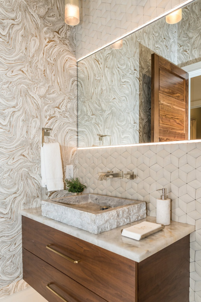 Contemporary cloakroom in Orlando with flat-panel cabinets, medium wood cabinets, a one-piece toilet, beige tiles, stone tiles, multi-coloured walls, marble flooring, a vessel sink, quartz worktops, white floors, white worktops, a floating vanity unit, a wallpapered ceiling and wallpapered walls.