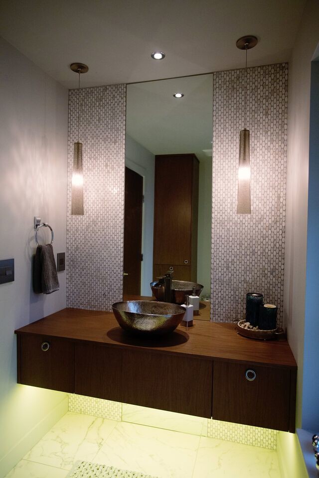 This is an example of a small modern powder room in Vancouver with a vessel sink, wood benchtops, white tile, mosaic tile, grey walls, porcelain floors, flat-panel cabinets, dark wood cabinets, brown benchtops and white floor.