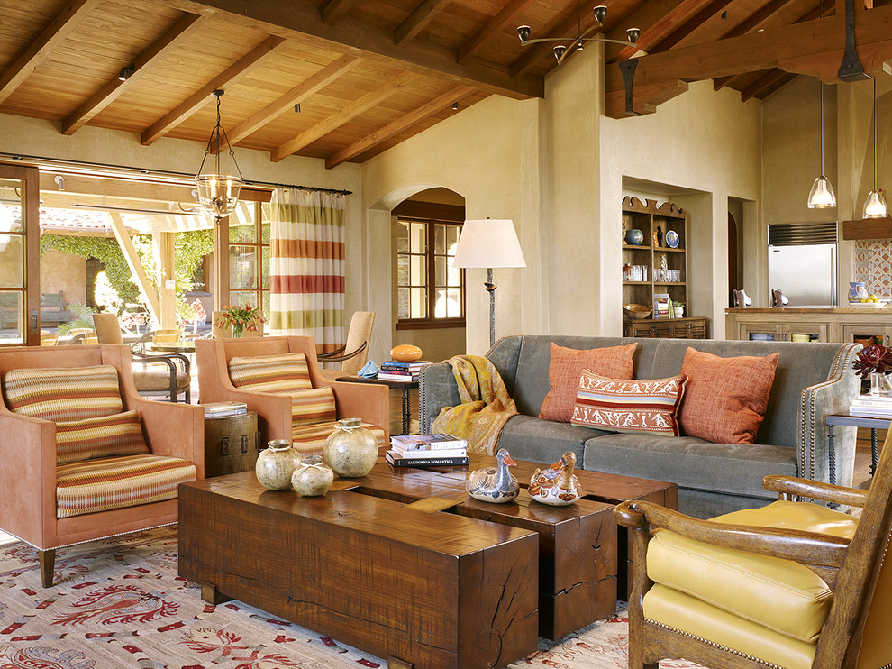 This is an example of a mediterranean open concept living room in San Francisco with beige walls.
