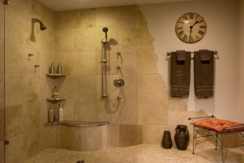 Inspiration for a mid-sized contemporary master bathroom in Boston with an open shower, beige tile, stone tile, beige walls and mosaic tile floors.