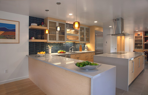 A modern kitchen with concrete-like countertops