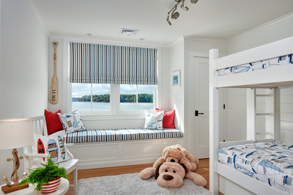 Photo of a mid-sized beach style kids' room in Portland Maine.