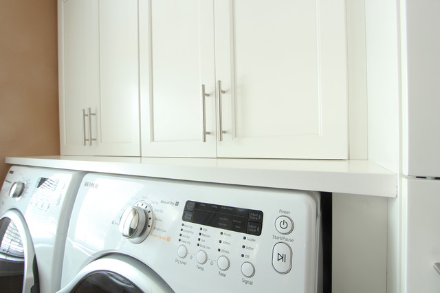 Wood Countertop Above Side By Side Washer And Dryer Transitional