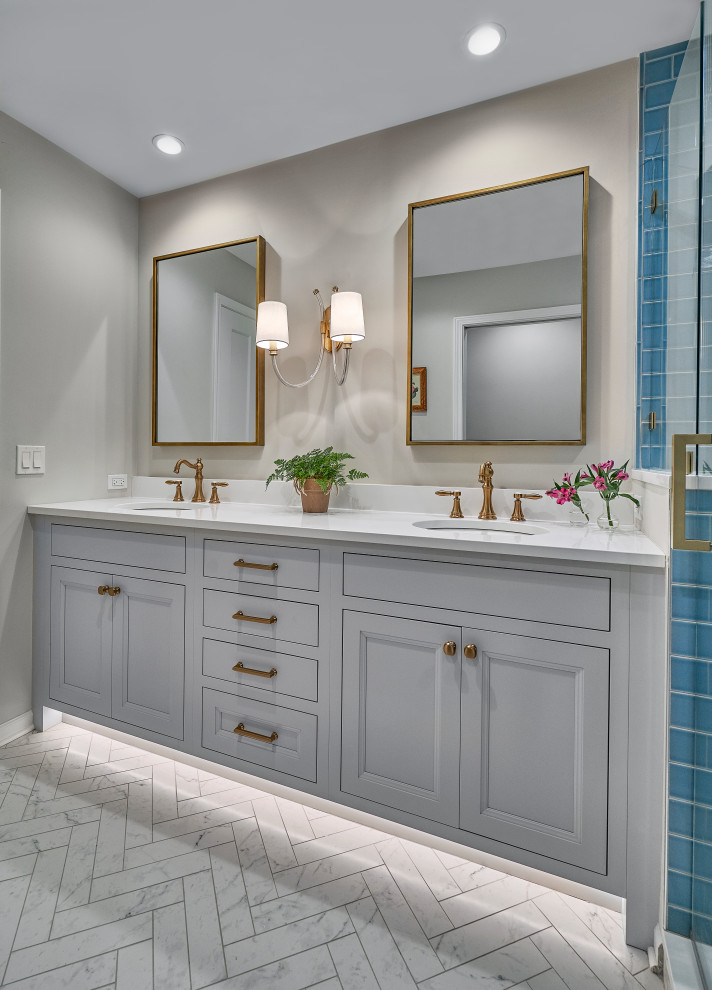 Medium sized traditional ensuite bathroom in Chicago with recessed-panel cabinets, white cabinets, a two-piece toilet, blue tiles, ceramic tiles, white walls, marble flooring, a submerged sink, engineered stone worktops, white floors, a hinged door, white worktops, a shower bench, double sinks and a built in vanity unit.