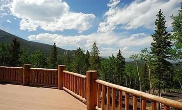 Deck - mid-sized rustic backyard deck idea with no cover