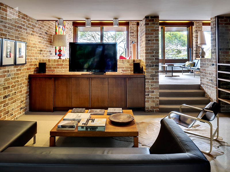 Photo of a midcentury family room in Sydney.