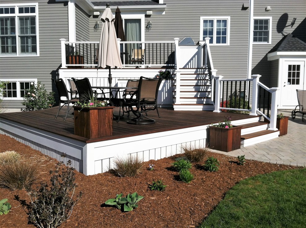 Large trendy backyard outdoor kitchen deck photo in Providence with no cover