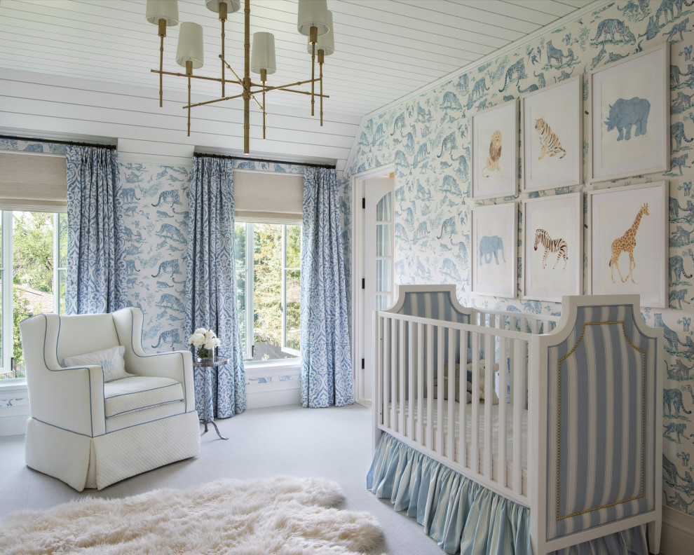 Inspiration for a timeless boy carpeted, shiplap ceiling and wallpaper nursery remodel in Denver with blue walls