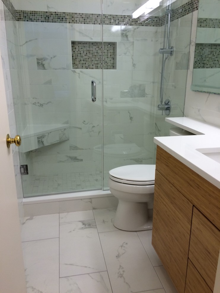 Photo of a mid-sized contemporary master bathroom in Chicago with an undermount sink, flat-panel cabinets, light wood cabinets, quartzite benchtops, an alcove shower, a two-piece toilet, porcelain tile, porcelain floors and white tile.