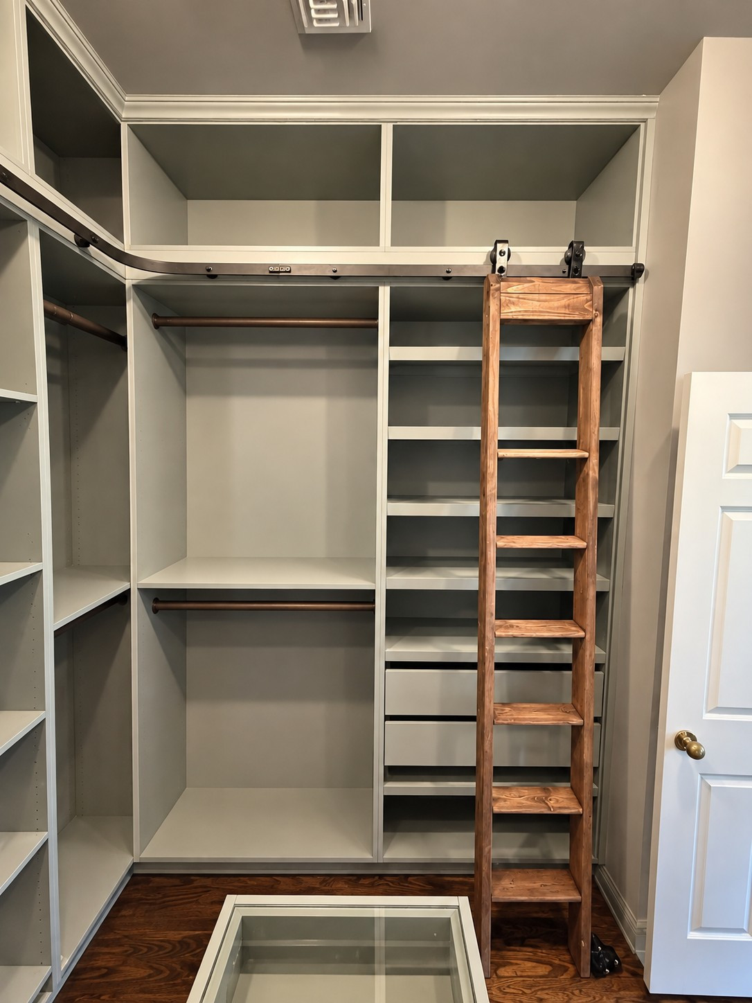 Custom Walk-In Closet with Built-In Storage & Glass-Top Island