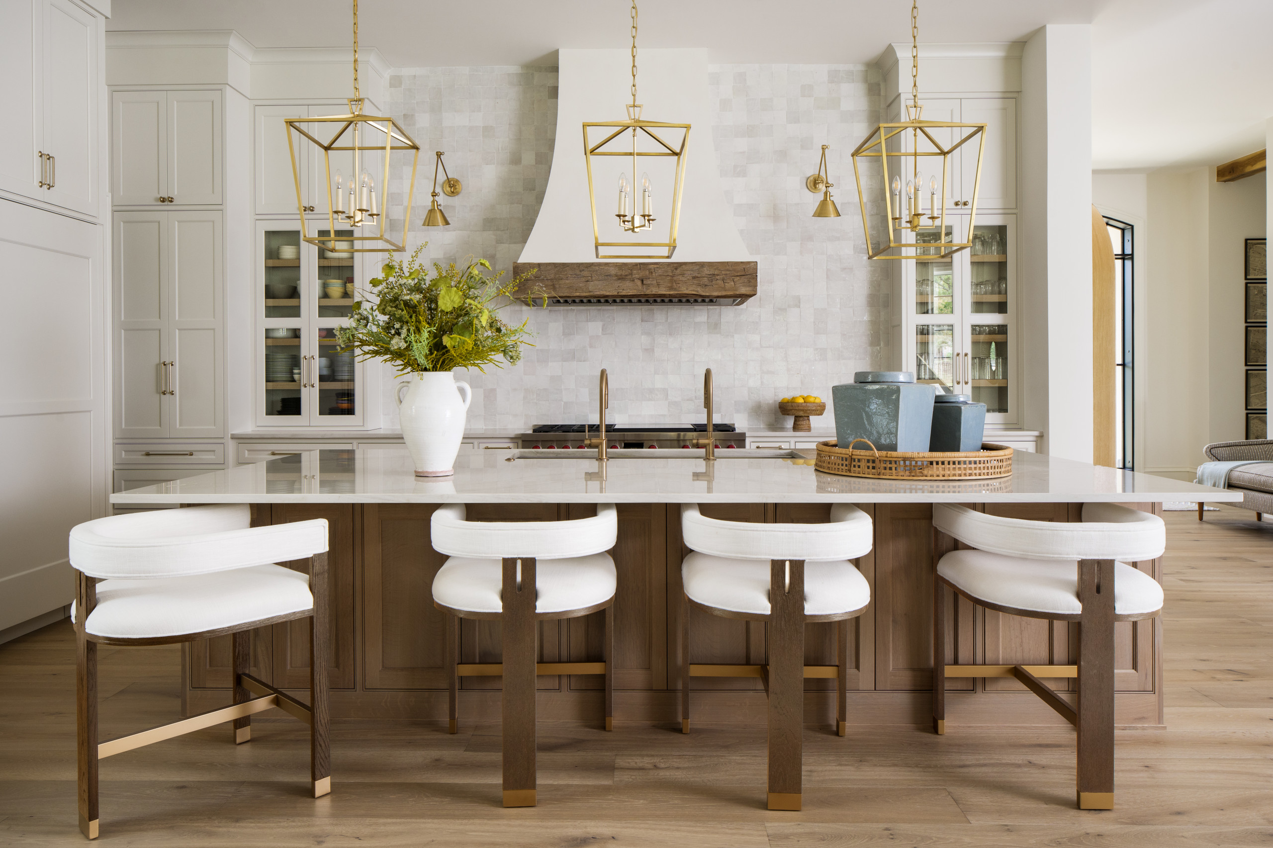 Open concept kitchen - large french country l-shaped light wood floor and brown floor open concept kitchen idea in Dallas with an undermount sink, beaded inset cabinets, white cabinets, quartzite coun