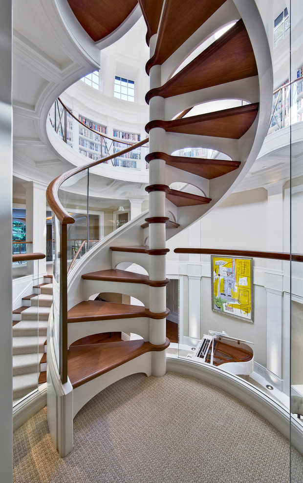 Transitional wood spiral staircase in Detroit.