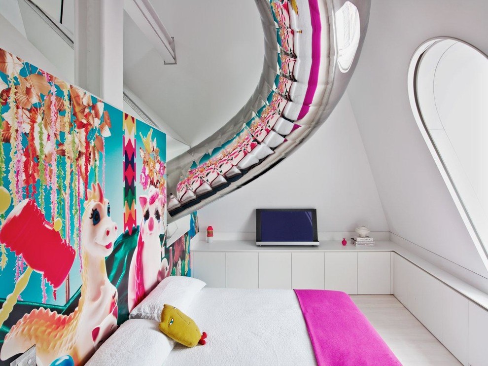 Inspiration for a contemporary kids' room for girls in New York with white walls and light hardwood floors.