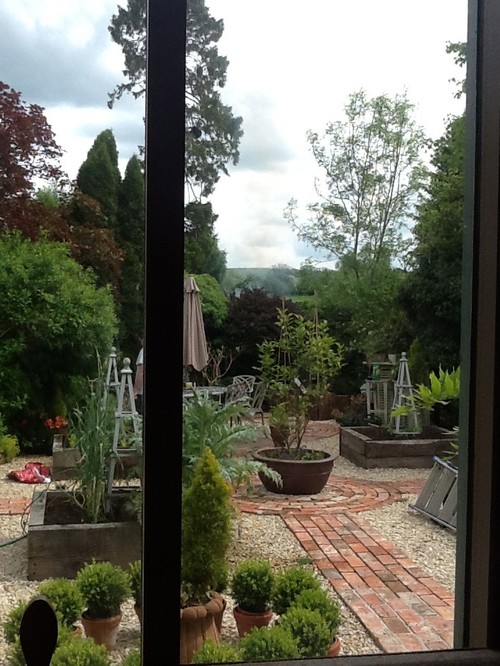 Cost to brick a small back patio?