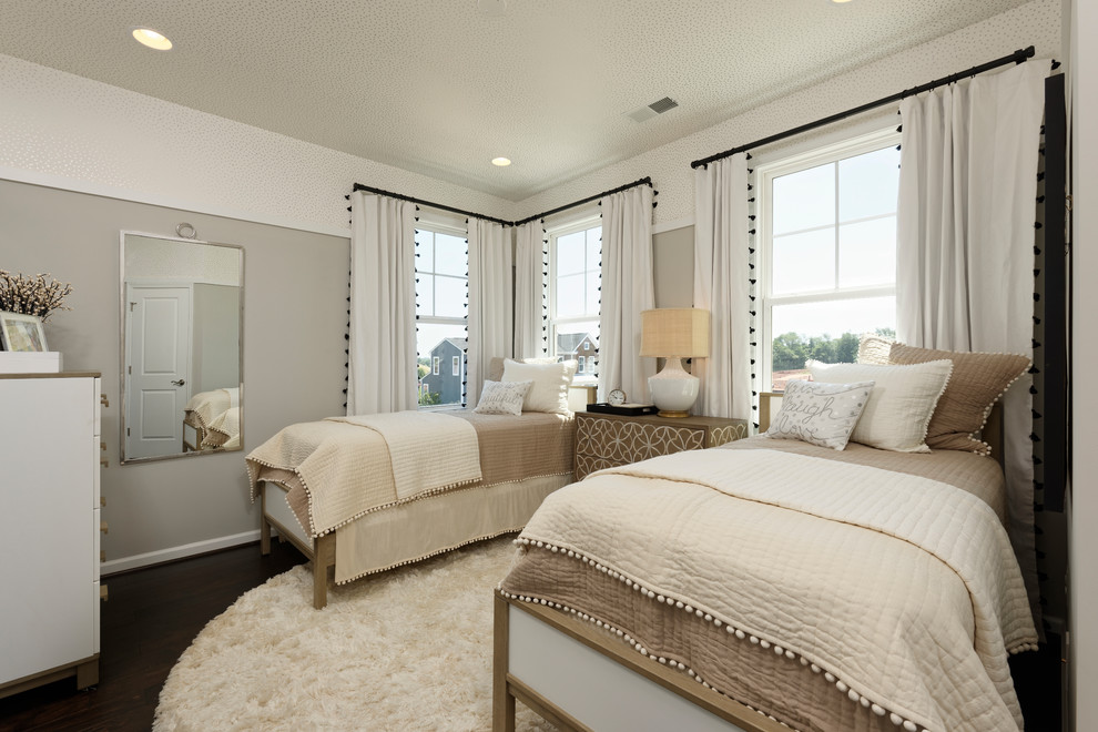 Inspiration for a large transitional guest bedroom in DC Metro with white walls, vinyl floors, no fireplace and brown floor.