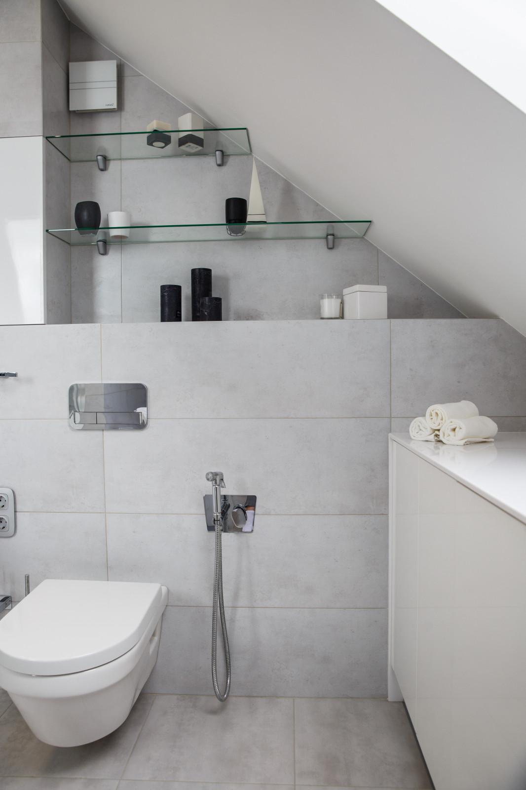 Двухэтажная квартира с мансардным потолком